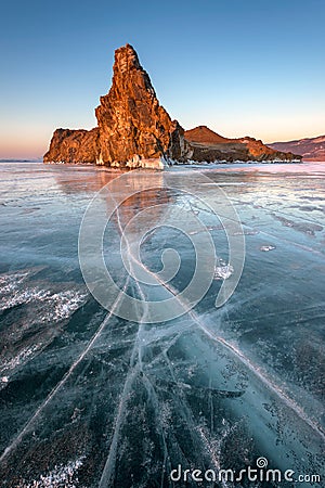 Famous Baikal Lake Ice and Island Oltrek at Sunrise, Baikal Lake Stock Photo