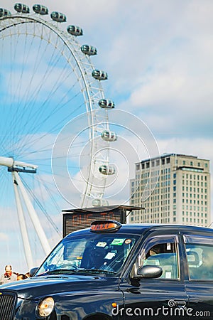 Famous black cab an a street in London Editorial Stock Photo