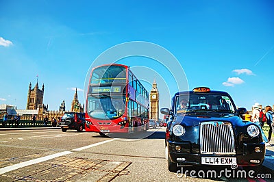 Famous cab on a street in London Editorial Stock Photo