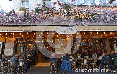 The famous Cafe Le Vrai Paris . It is located in the Montmartre, Paris, France. Editorial Stock Photo