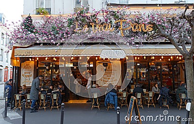 The famous Cafe Le Vrai Paris . It is located in the Montmartre, Paris, France. Editorial Stock Photo