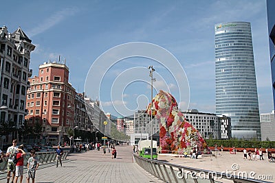 Famous dog flowers sculpture `The Puppy` by Jeff Koons, Bilbao. Editorial Stock Photo