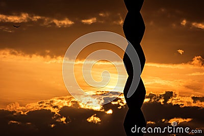 Sunset behind the Endless Column by Brancusi Editorial Stock Photo