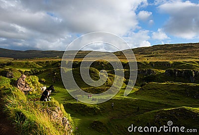 Highland mountain with a lonely people and dog on top , Skye,Scotland Stock Photo