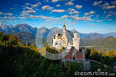 Famous fairy tale Castle in Bavaria, Neuschwanstein, Germany, morning with blue sky with white clouds Stock Photo