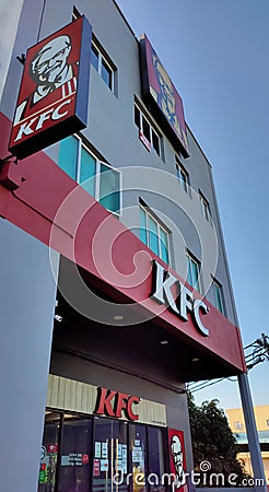 A famous fast food,KFC (short for Kentucky Fried Chicken) is an American fast food restaurant. Editorial Stock Photo