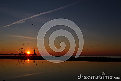 The Ferris Wheel at the End of the Pier Stock Photo