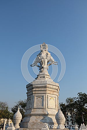 Famous four head statue of elephant in Thailand capital city Bangkok. White elephant statue near street Stock Photo
