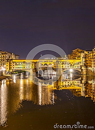 Historic Ponte Veccio in Florence at river Arno Stock Photo