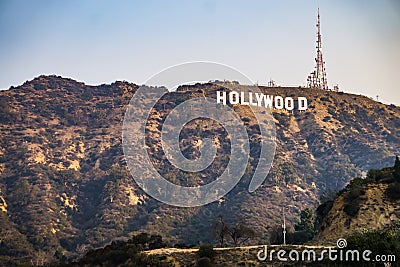 Famous hollywood sign on a hill in a distance Editorial Stock Photo