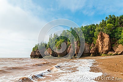 Famous Hopewell Rocks flowerpot formations at low tide Stock Photo