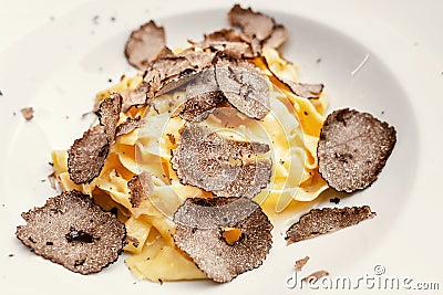 famous Italian delicacy is pasta with truffles. Dish of the day from the chef Stock Photo