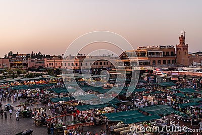 The famous Jamaa el Fna square in Marrakech, Morocco. Jemaa el-Fnaa, Djema el-Fna or Djemaa el-Fnaa is a famous square and market Editorial Stock Photo