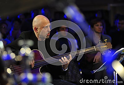 Famous jazz bassist Igor Zacus playing bass guitar on stage Editorial Stock Photo