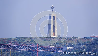 Famous Jesus Christ statue on the hill of Lisbon - Cristo monument Stock Photo