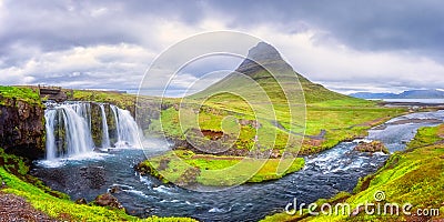 Famous Kirkjufellsfoss waterfall with Kirkjufell church mountain on the background, beautiful landscape, Iceland Stock Photo