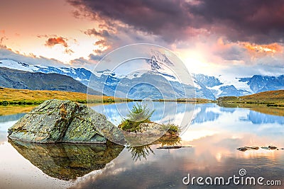 Famous Matterhorn peak and Stellisee alpine glacier lake,Valais,Switzerland Stock Photo