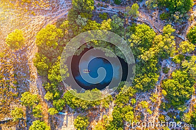 Famous Melissani lake on Kefalonia island, Karavomylos, Greece. On top of Melissani Cave (Melissani Lake) in Karavomylos village Stock Photo