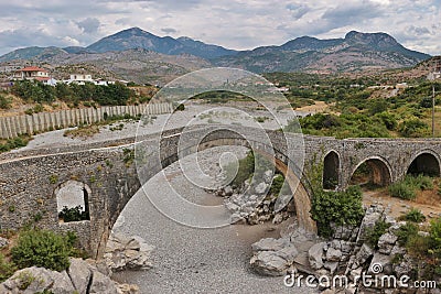 The famous Mesi bridge in Mes, Albania. Stock Photo