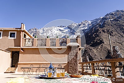 Famous Moroccan mint tea and silver kettle in High Atlas mountains Stock Photo