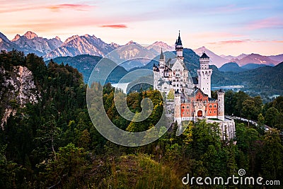 The famous Neuschwanstein castle during sunrise Stock Photo