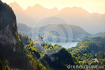 Famous Neuschwanstein Castle, fairy-tale palace on a rugged hill above the village of Hohenschwangau near Fussen Stock Photo