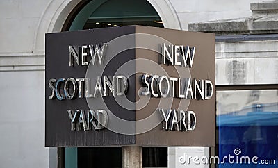 Famous New Scotland Yard sign outside the Headquarters of the Metropolitan Police Editorial Stock Photo