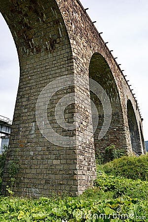 The famous old viaduct in the Ukrainian mountains. Carpathians, Vorokhta. Stock Photo