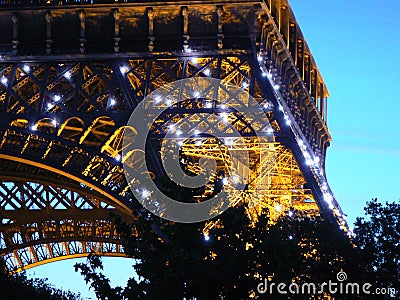 Illuminated Eiffel Tower Arch Editorial Stock Photo