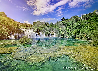 Famous, popular waterfall Skradinski Buk on natural sky and tree background. Dalmatia, Croatia. Beautiful place for tourist. Stock Photo