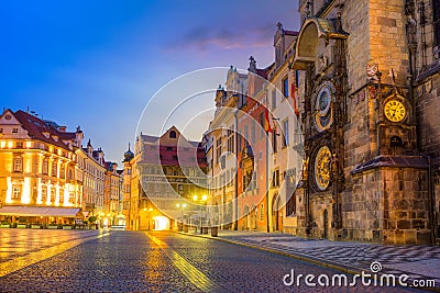 Famous Prague clock Orloj and center of old city at night Stock Photo