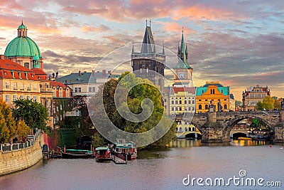 Famous Prague Landmarks - towers and bridge at sundown Stock Photo