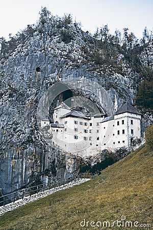 Famous Predjama castle in the mountain, build inside the rock, Slovenia Stock Photo