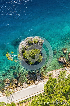 Punta Rata beach with little island in Brela, Dalmatia, Croatia Stock Photo