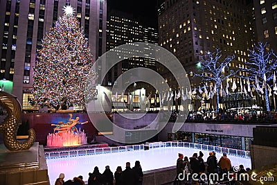 The famous Rockefeller Center Christmas Tree and Prometheus Statue at Rockefeller Center Editorial Stock Photo
