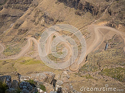 The famous Sani mountain pass dirt road with many tight curves connecting Lesotho and South Africa Stock Photo