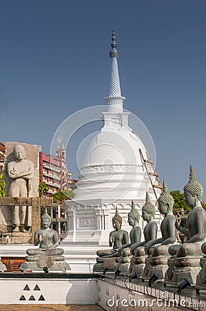 Famous sitting Buddha statues and stupa in the Seema Malaka Temple in Colombo, Sri Lanka. This is situated on Beira Lake and is Editorial Stock Photo