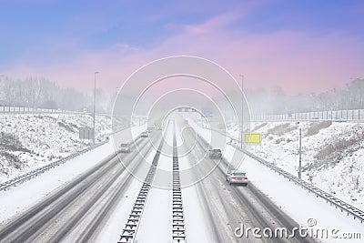 The famous A9 in a snowstorm in winter near Amsterdam the Netherlands at sunset Stock Photo