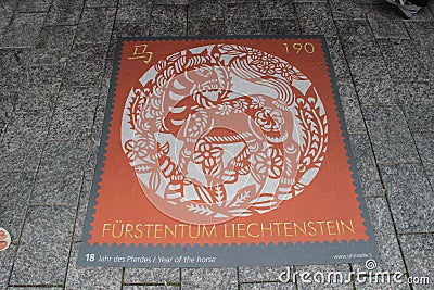 Famous stamp museum in Vaduz and next to it is a stamp drawing released for the year of the horse Editorial Stock Photo