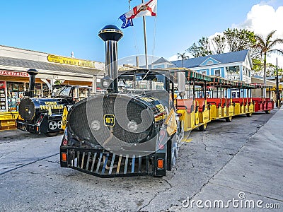 Famous Tourist Conch Train on Duval Street in Key West, Florida. Editorial Stock Photo