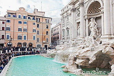 Famous Trevi fountain with tourist crowd in Rome Editorial Stock Photo