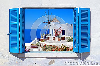 Famous windmill in Oia village, Santorini island Stock Photo