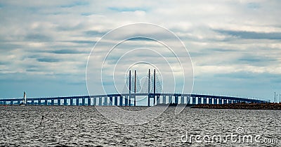 Ã˜resund bridge with cloudy sky and water Stock Photo