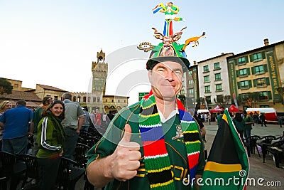 Fan of the South Africa national rugby union team wears an interesting hat with symbols Editorial Stock Photo