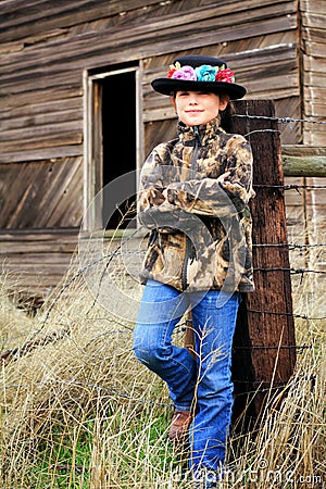 Fancy Flower Hat and Camo Stock Photo