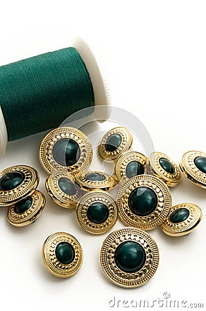 Fancy Green and Gold Sewing Buttons Stock Photo