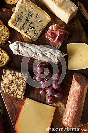 Fancy Meat and Cheeseboard with Fruit Stock Photo