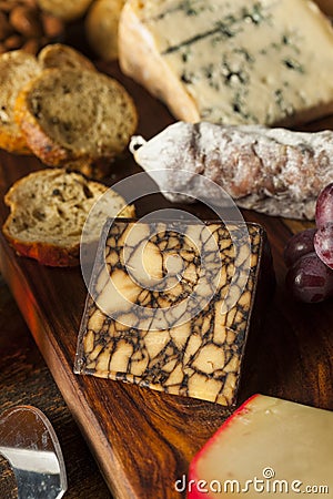 Fancy Meat and Cheeseboard with Fruit Stock Photo