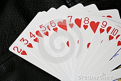 Heart Suit of Cards on Textured Background Stock Photo