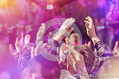 Fans Applauding To Music Band Live Performing on Stage Stock Photo